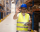 demo-attachment-902-warehouse-worker-standing-large-storage-center-showing-ok-hand-gesture-satisfied-delivering-goods